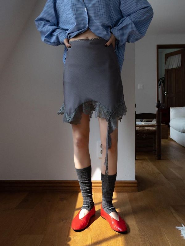 不對稱下擺蕾絲拼接裙 