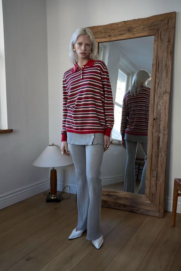 排釦裙襬坑條長褲 