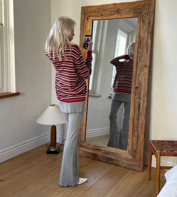 排釦裙襬坑條長褲 