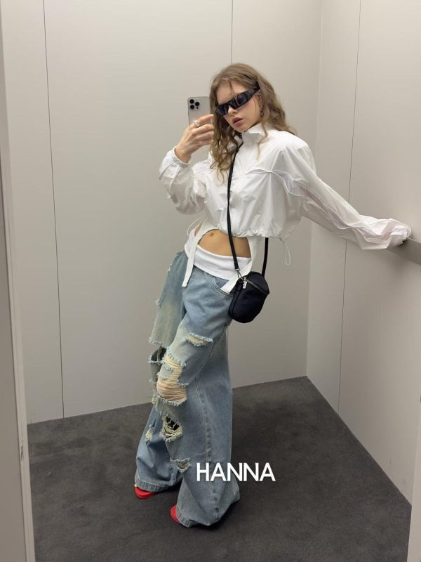 褲頭反摺多破損刷色牛仔褲 