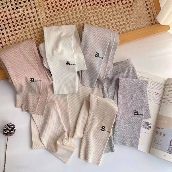 <<110-130>>氣質奶霧色修腿內搭褲 
