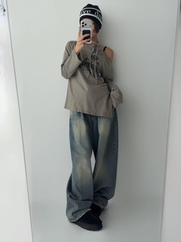 街頭感斜肩綁帶字母上衣 