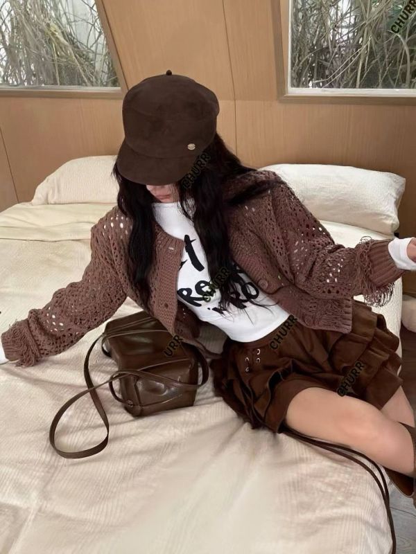 歐美感鏤空編織針織開衫 