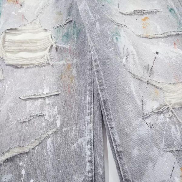 噴漆刷破直筒牛仔褲 