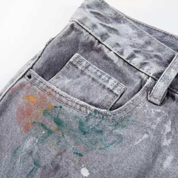 噴漆刷破直筒牛仔褲 