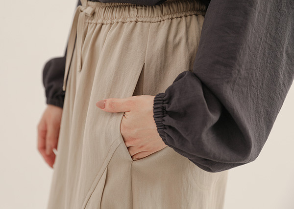 Feixu_飛絮剪接波浪長褲_卡其 