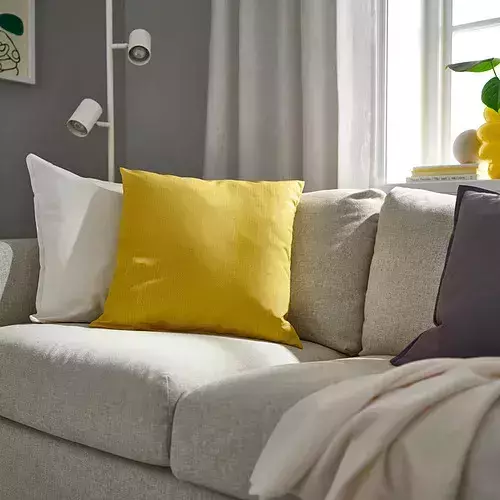 黃底白花紋抱枕 