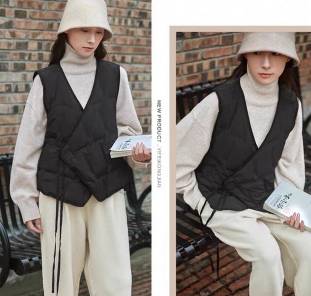 黑色腰間繫帶鋪棉背心 黑色腰間繫帶鋪棉背心