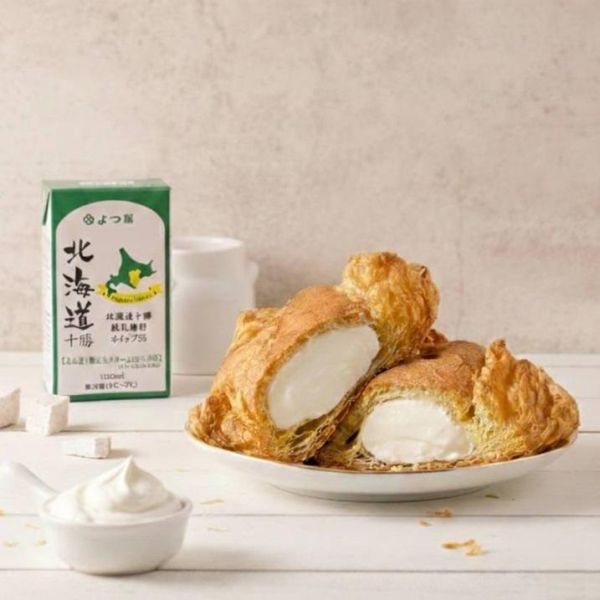 大份量起酥包 蛋糕體使用屏東蓬萊米穀粉製成,無麩質、輕盈柔軟,夾層中包裹著手炒芋泥餡、Q彈滑嫩的布丁,再加入西班牙鮮奶油,堆疊出入口即化的豐富層次。