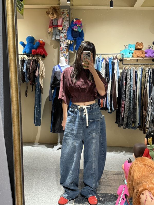 韓版反向弧線牛仔寬褲 