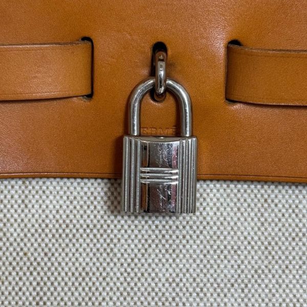 Hermès 帆布焦糖雙肩包 