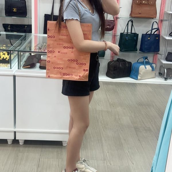 CHANEL 粉紅色帆布COCO印花包 