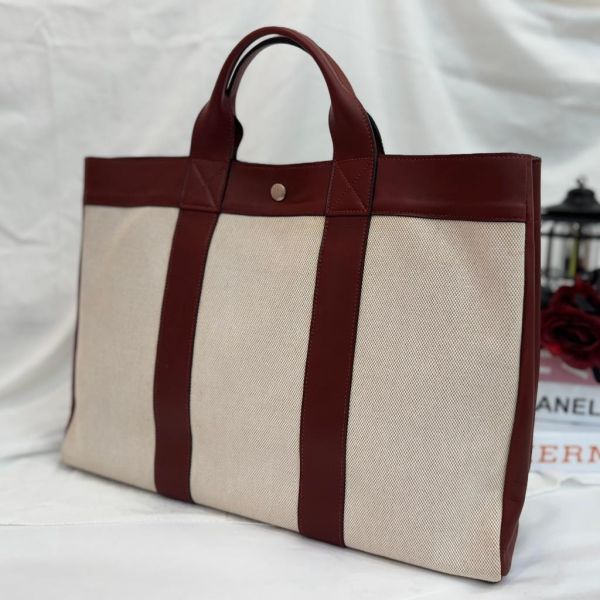 Hermès 皮革帆布手提包 