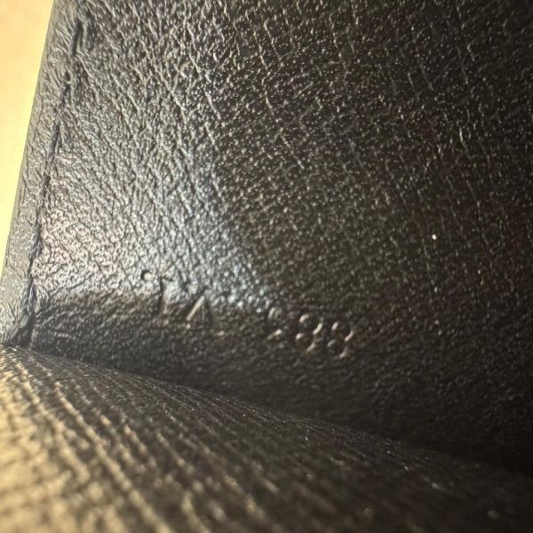 LV EPI水波紋黑色信封手拿包 