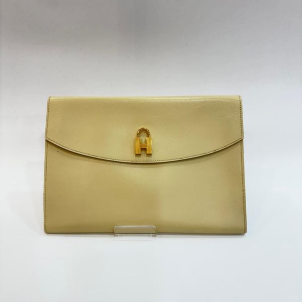 HERMES 奶白色牛皮鎖頭手拿包 