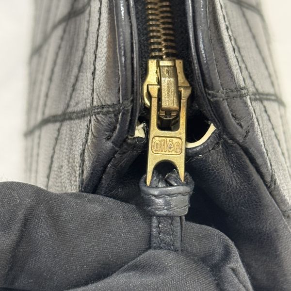 Chanel 黑色小羊皮菱格手拿包 