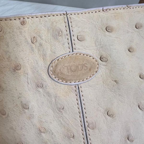 TOD'S 膚色液下包 
