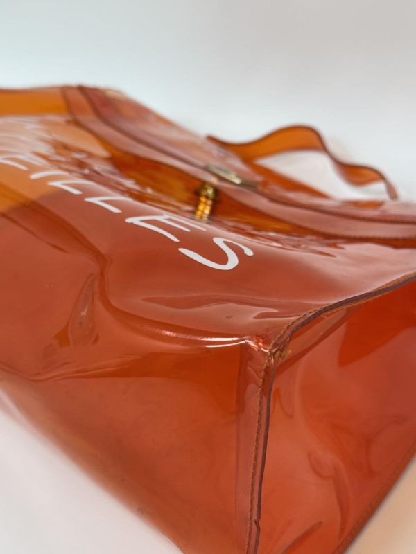 Hermès「Vinyl Kelly」透明橘限量包 
