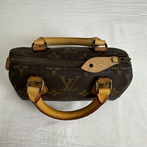 𝐋𝐨𝐮𝐢𝐬 𝐕𝐮𝐢𝐭𝐭𝐨𝐧 中古款 speed nano 手拿包 