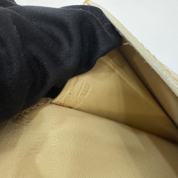 HERMES 奶白色牛皮鎖頭手拿包 