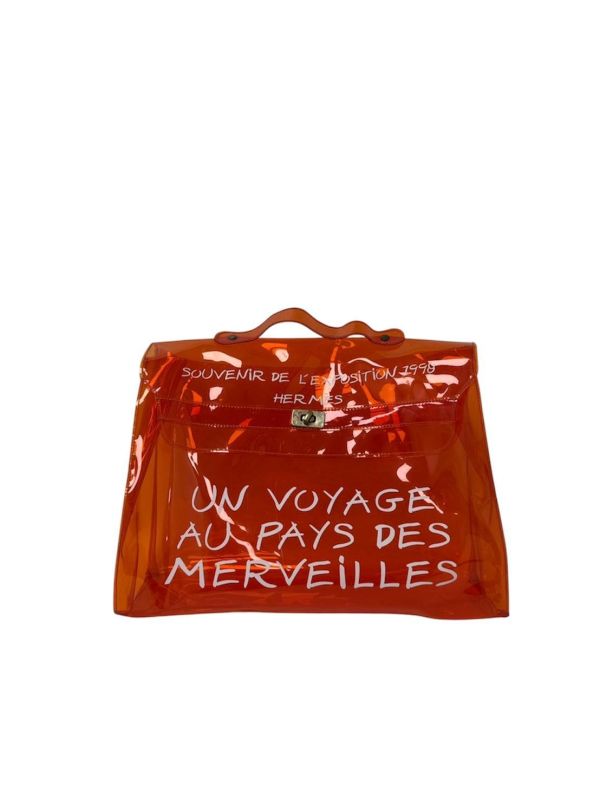 Hermès「Vinyl Kelly」透明橘限量包 
