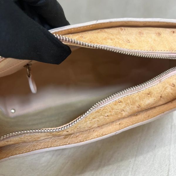 TOD'S 膚色液下包 