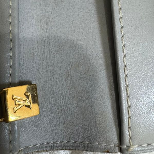 Louis Vuitton 黃色漆皮多功能皮夾腰包 