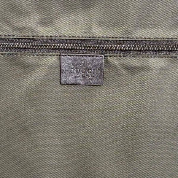 Gucci 滿版老花西裝手提包 
