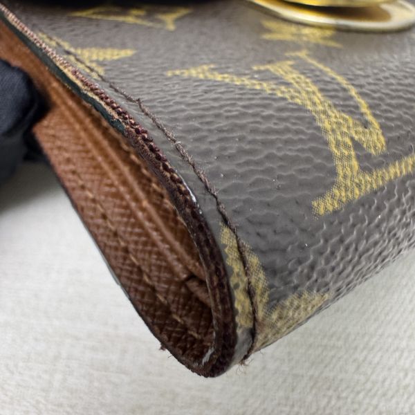 Louis Vuitton 曼哈頓金釦短夾 
