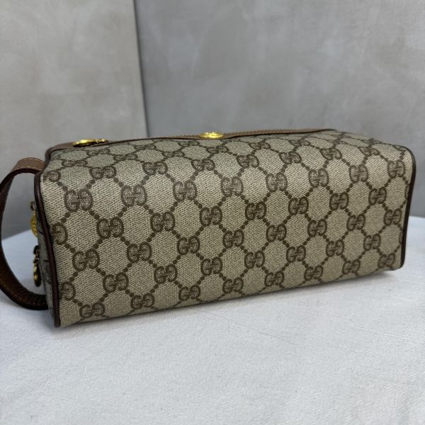 Gucci 復古 GG 圖騰手拿包 
