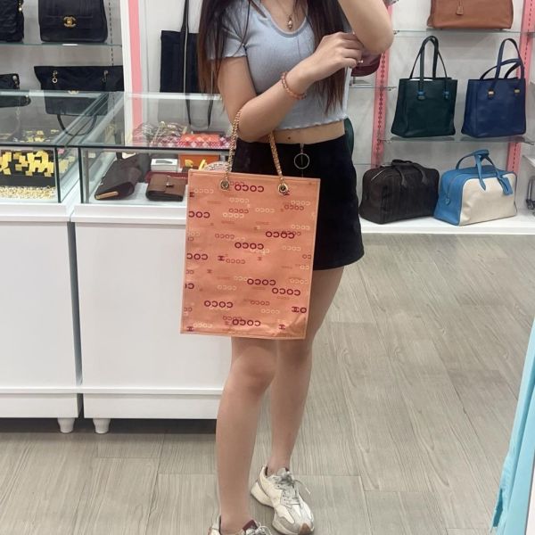 CHANEL 粉紅色帆布COCO印花包 