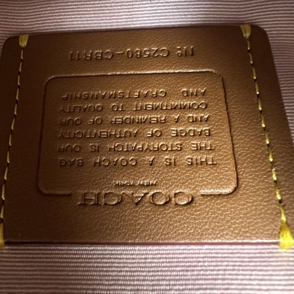 COACH 牛仔斜背兩用彎月包 