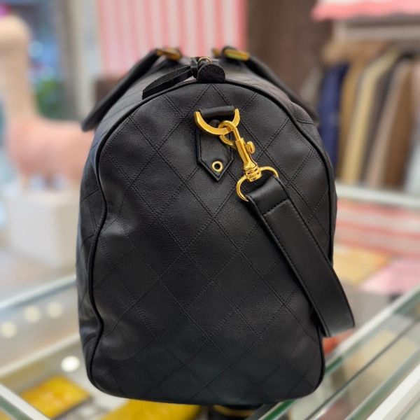 Chanel 菱格紋黑金旅行袋 