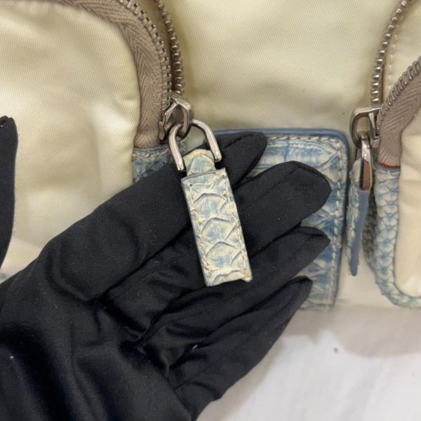 Prada 蛇皮拼接腋下包 