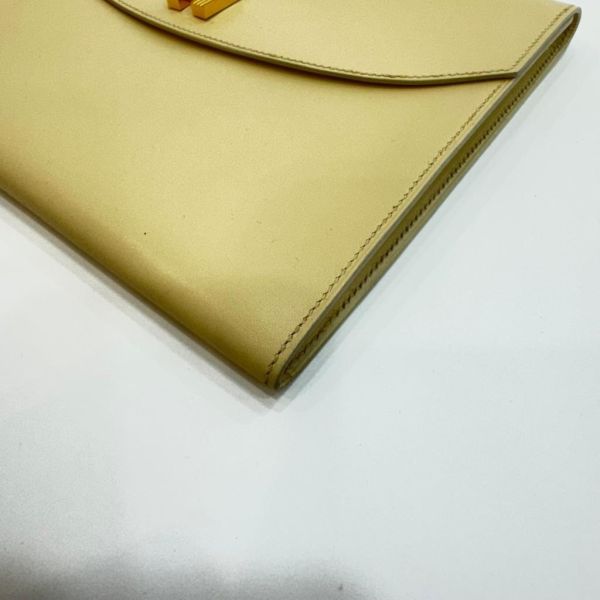 HERMES 奶白色牛皮鎖頭手拿包 