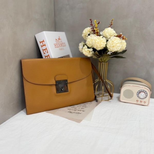 Hermès 金棕色手拿包 