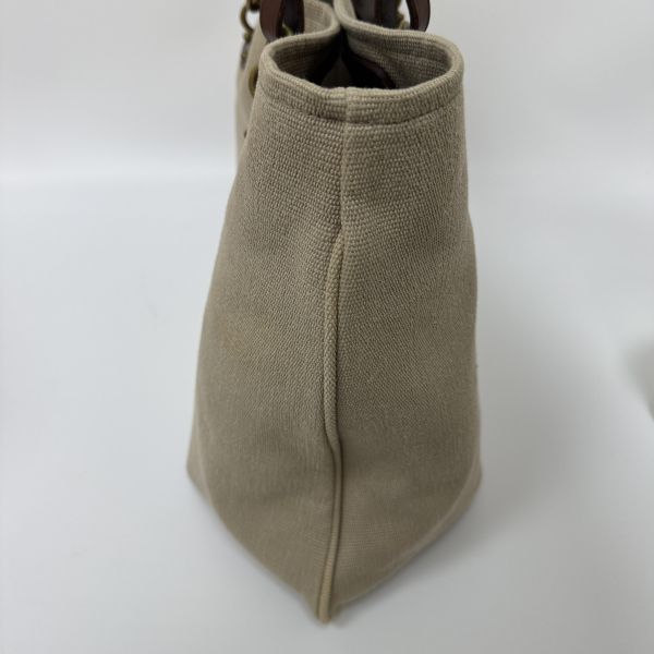 BOTTEGA VENETA 帆布金釦手腕袋卡其 