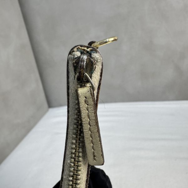 GUCCI 中古米色壓印老花一字拉鍊零錢包卡包 