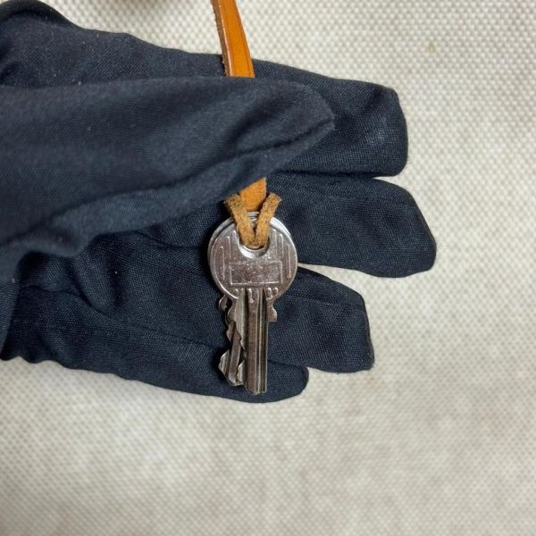 Hermès 帆布焦糖雙肩包 