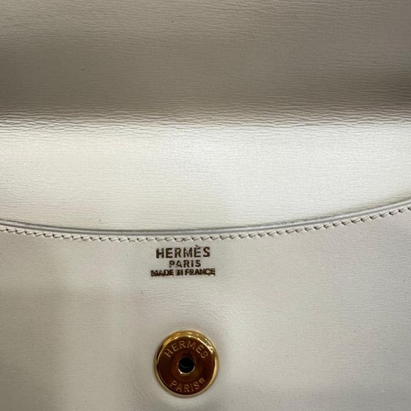 HERMES 奶白色牛皮鎖頭手拿包 