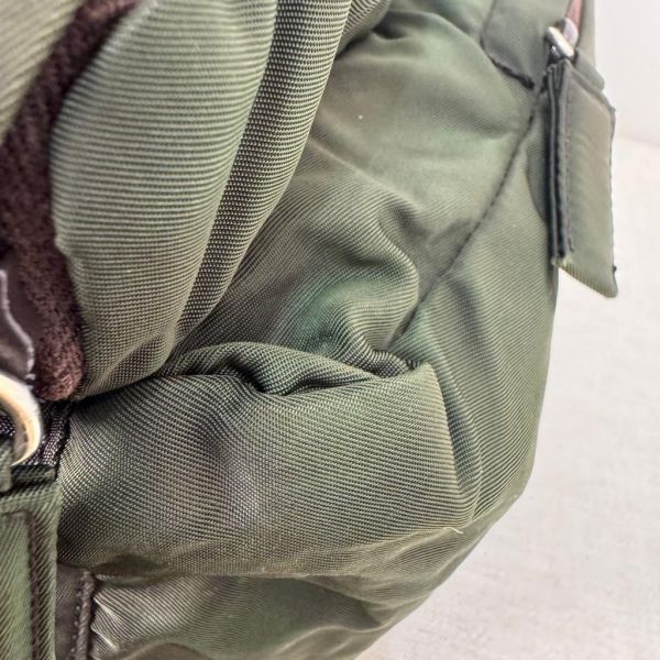 PRADA 墨綠帆布鐵牌後背包 