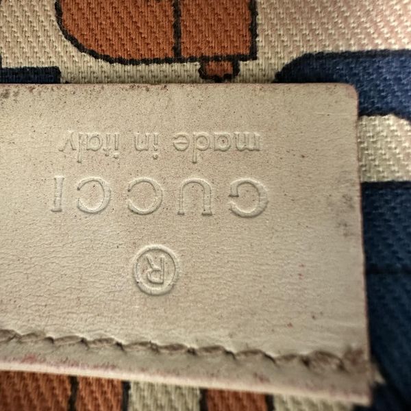 GUCCI 中古米色壓印老花一字拉鍊零錢包卡包 