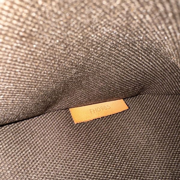 Louis Vuitton  Monogram 帆布西裝套 