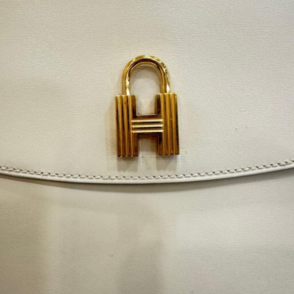 HERMES 奶白色牛皮鎖頭手拿包 