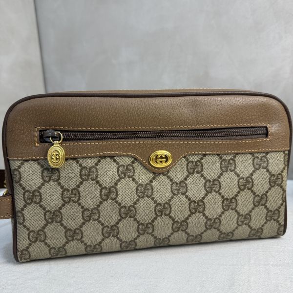 Gucci 復古 GG 圖騰手拿包 