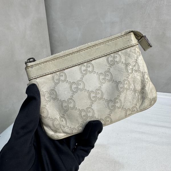 GUCCI 中古米色壓印老花一字拉鍊零錢包卡包 