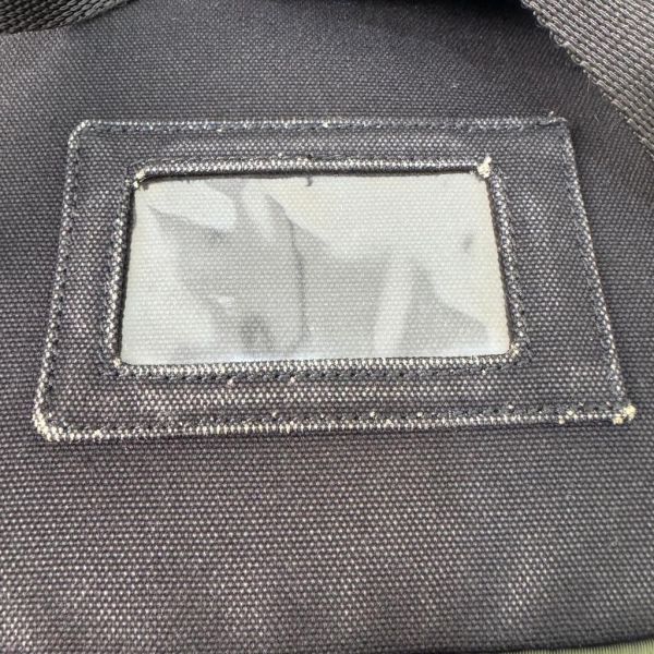 PRADA 墨綠帆布鐵牌後背包 