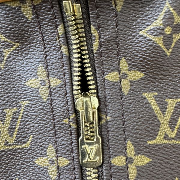 Louis Vuitton  Monogram 帆布西裝套 