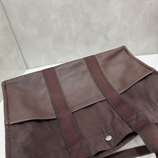 Hermès 帆布拼皮革手提包 