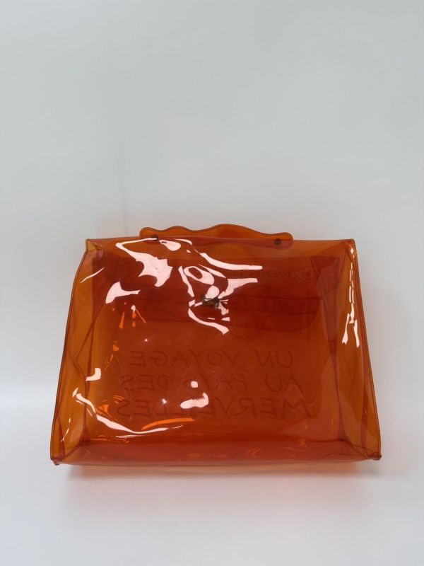 Hermès「Vinyl Kelly」透明橘限量包 